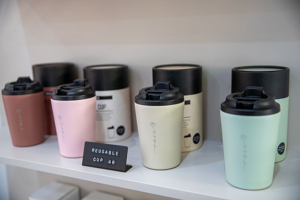 Cups on a shelf at Rosé Gelateria