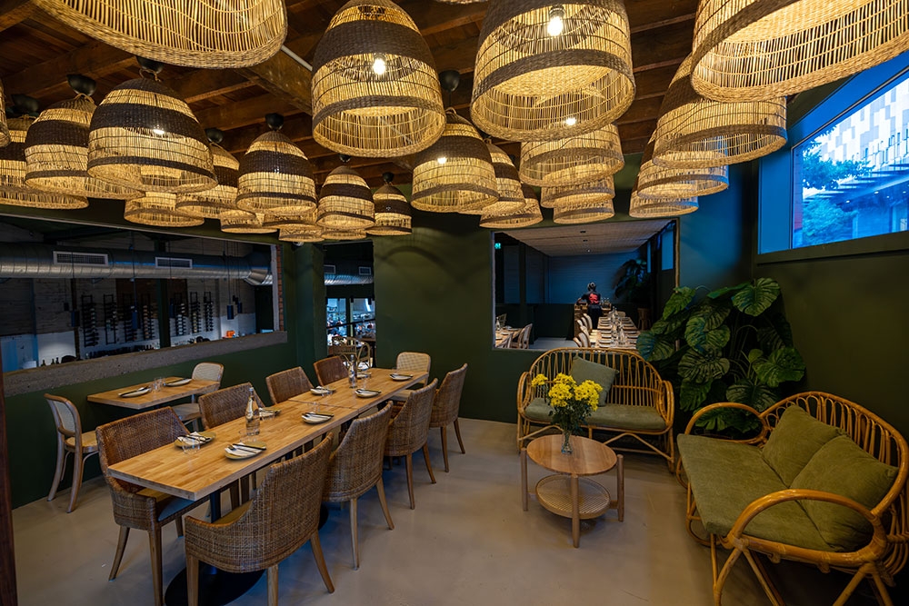 Lanterns and chairs in dining space in RUNG