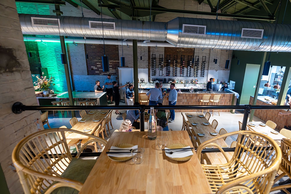 Looking down at bar from table on mezzanine