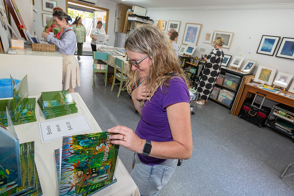 A lady looking at art 