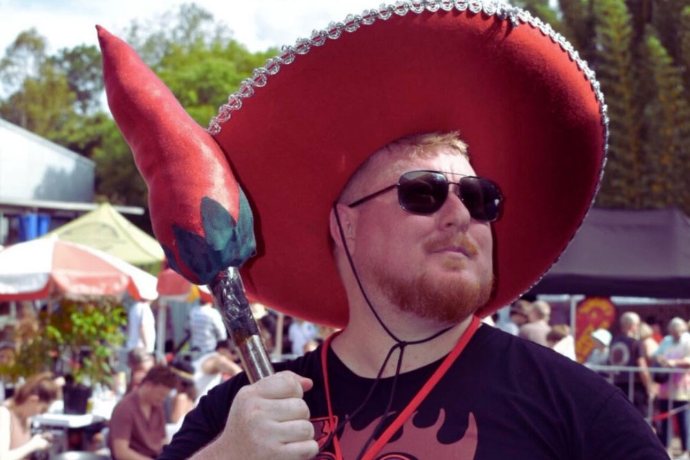 Man in sombrero with chilli 