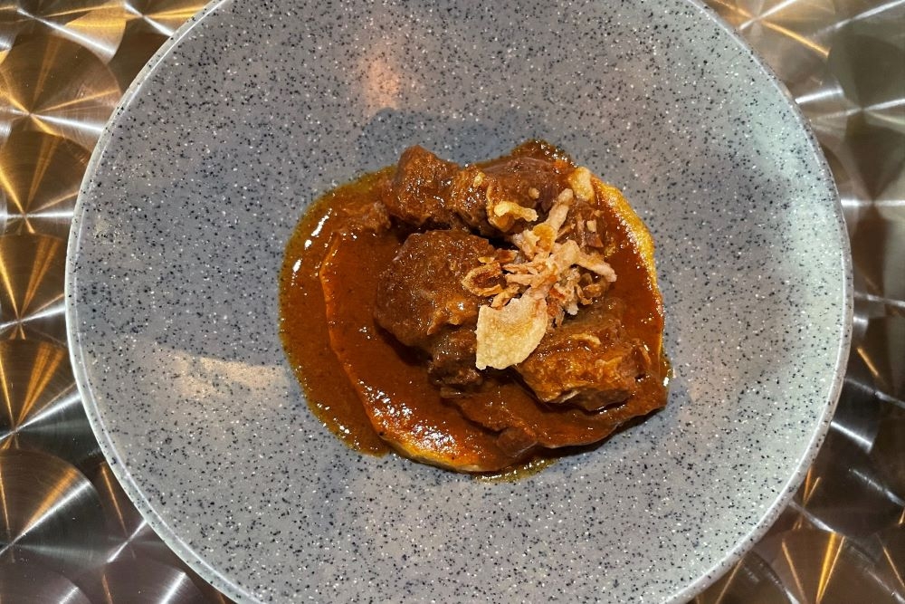 Indonesian street food on a plate at Sendok Garpu, Brisbane