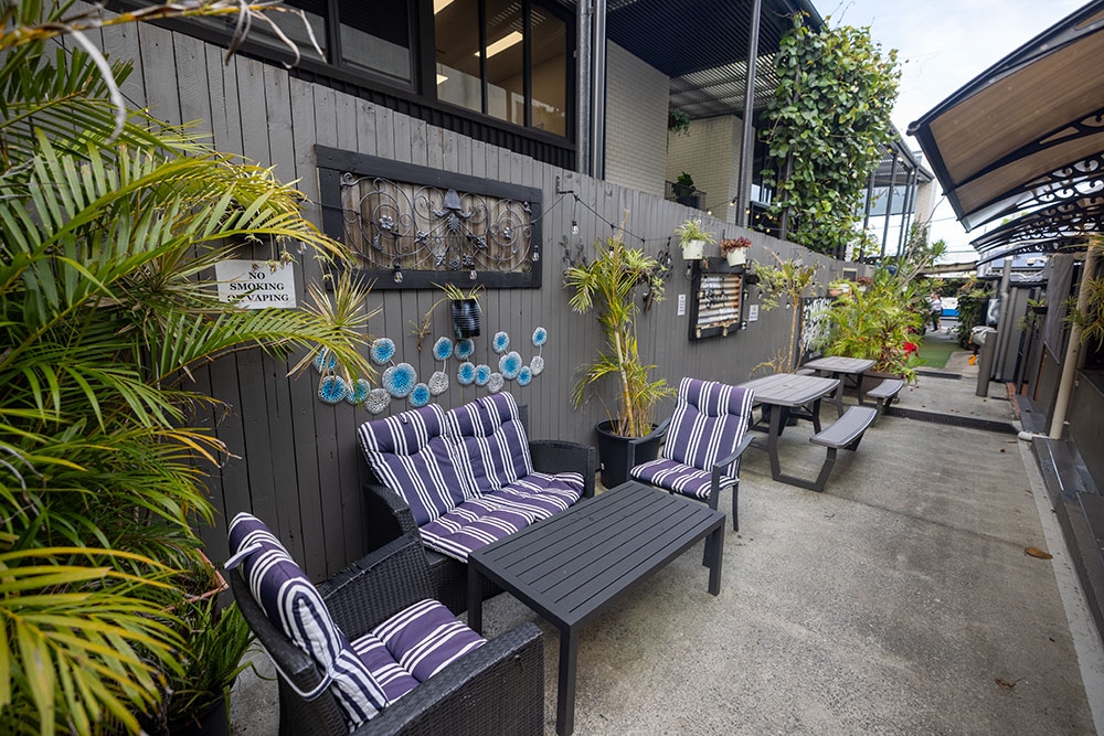 Seats in garden at Shady Palms