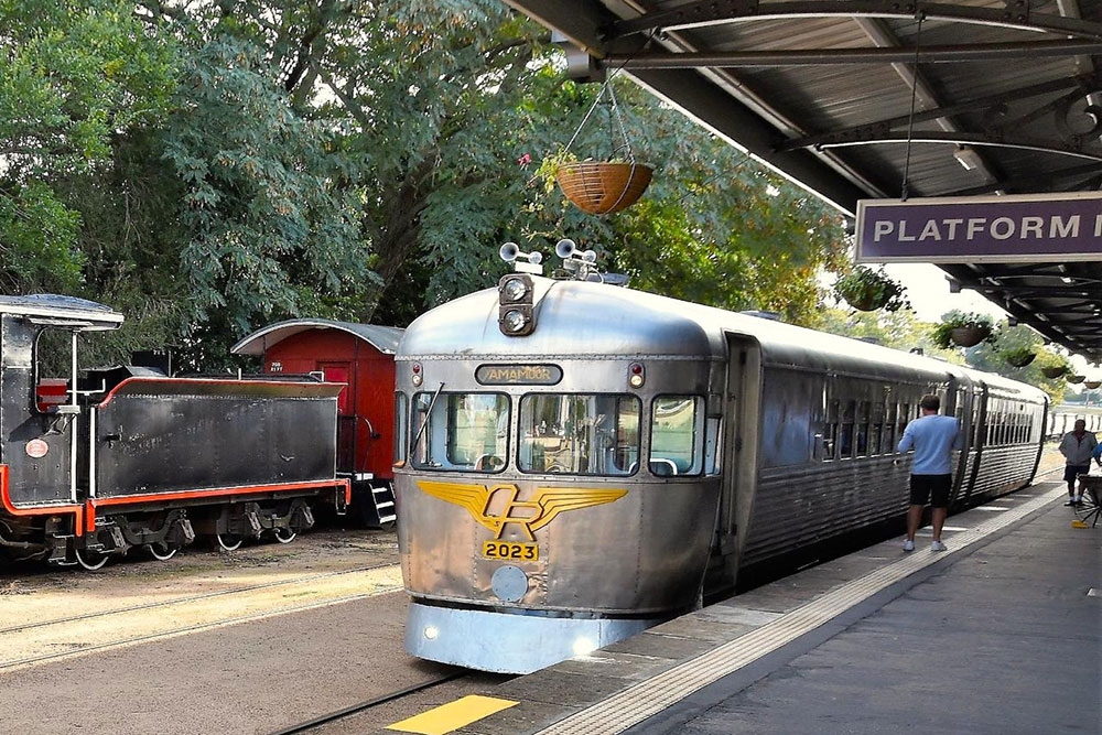 Silver Bullet Rail Motor parked at station