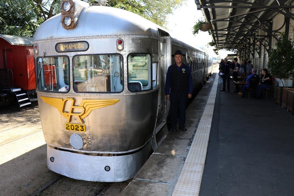 Silver Bullet Rail Motor parked at station