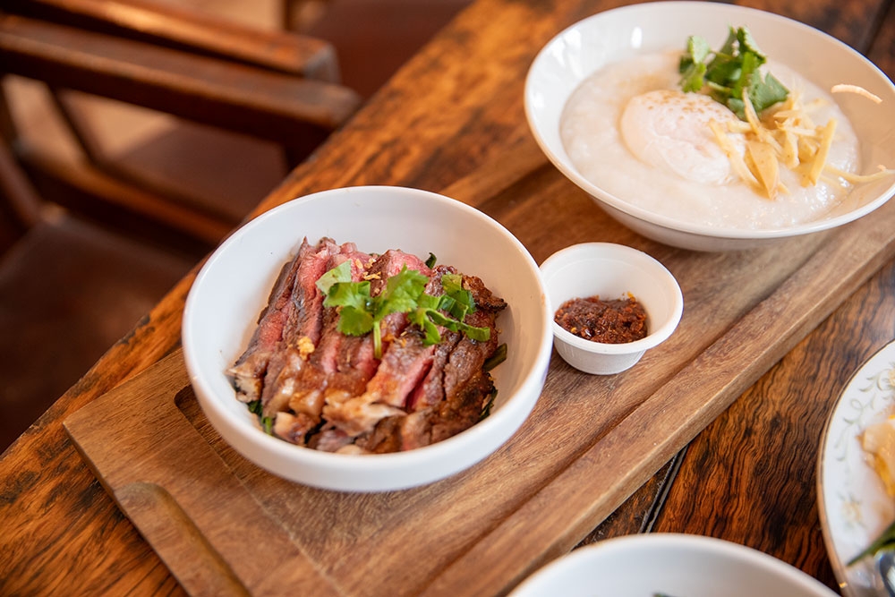 Two bowls of congee at So What Stereo 