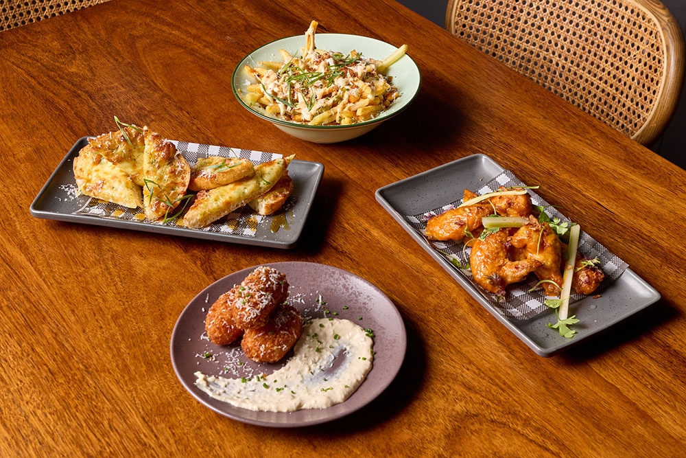 Plates of snacks on table at Gas Hound Kitchen & Bar