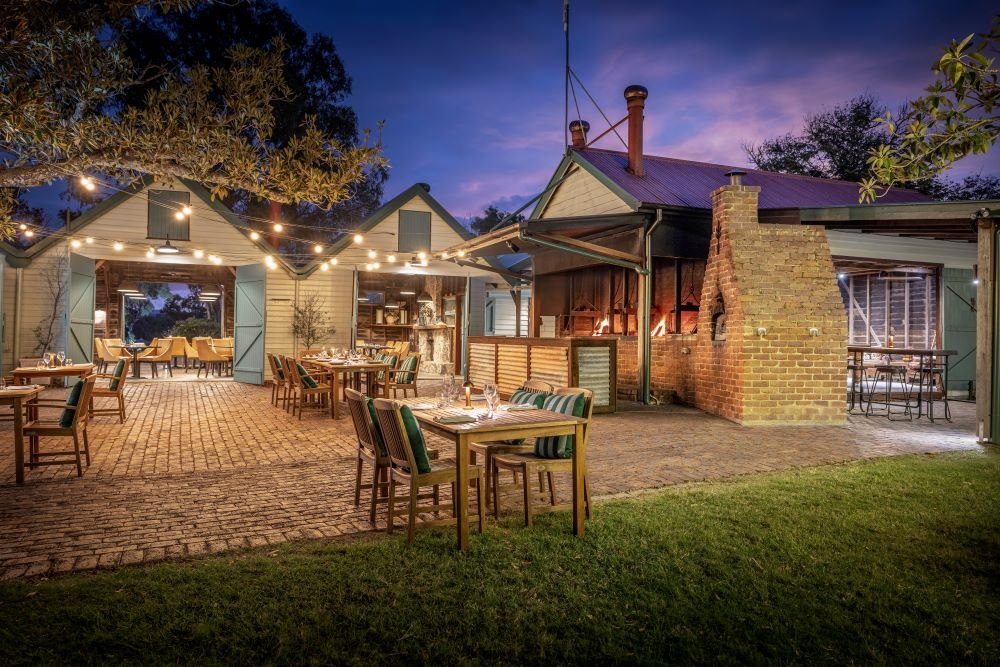 Outside seating at night at Spicers Hidden Vale, Grandchester 