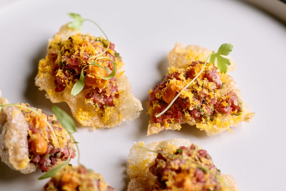 Steak-Tartare-with-Wagyu-Tendon,-Cured-Egg,-Creme-Friache,-Gochujang