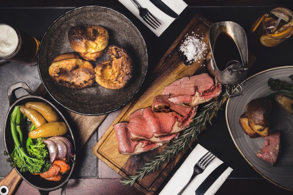 Food on plates at Electric Avenue Woolloongabba