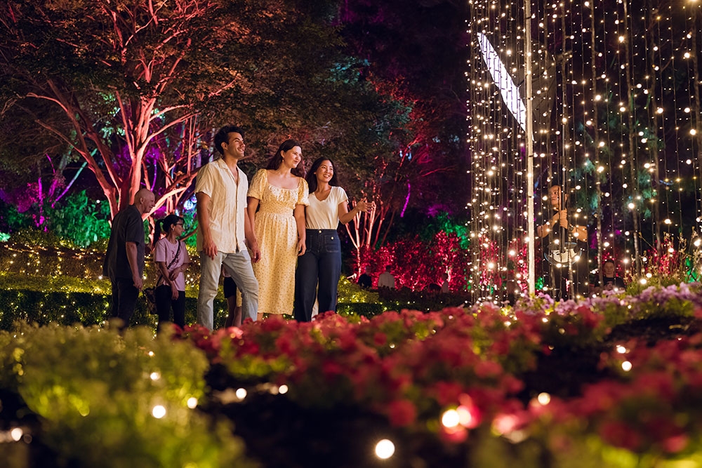 People walking on bridge The Enchanted Garden