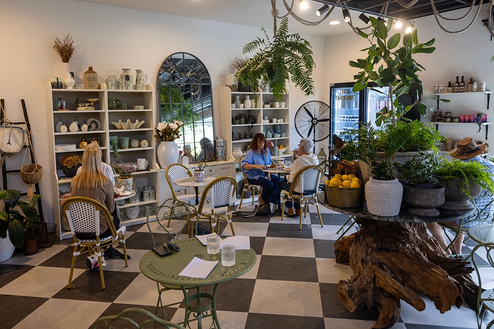 People seated inside at Tarte Tea Garden Currumbin