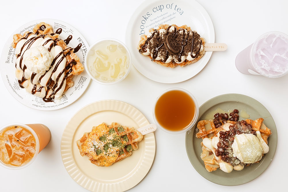 Four plates of Korean waffles and drinks at the Tea Station, Eight Mile Plains