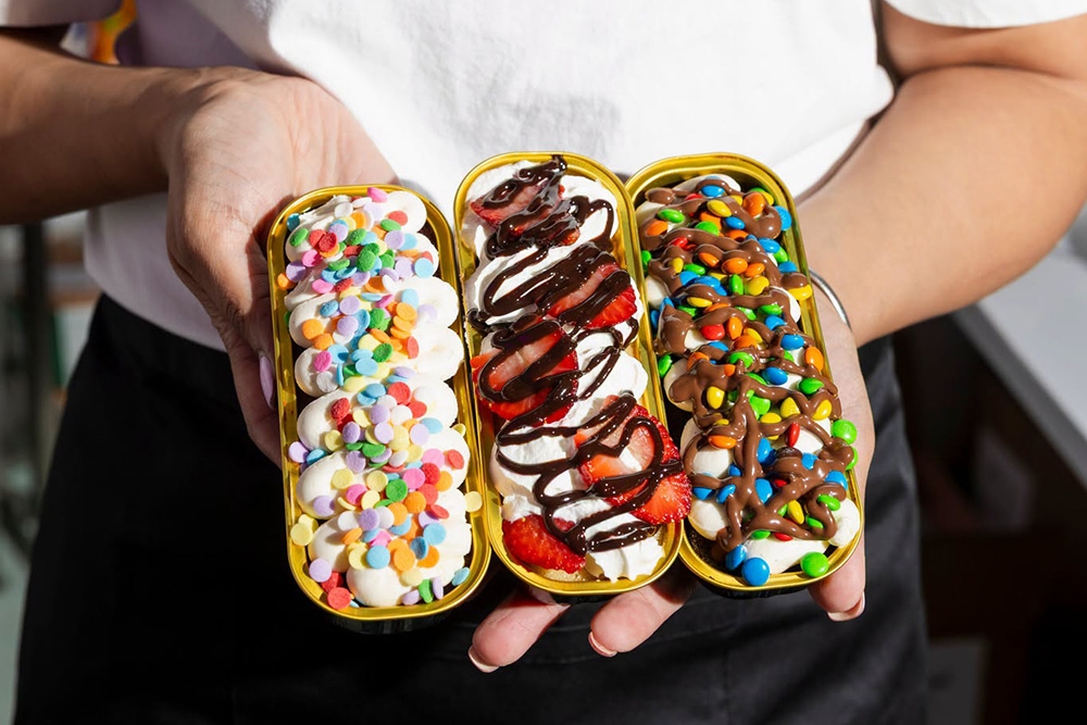 person holding cakes