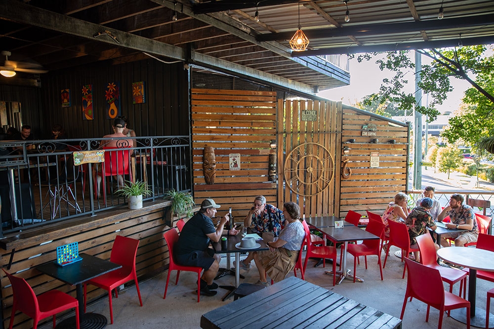 People sitting at tables in  Front Yard Bar Auchenflower