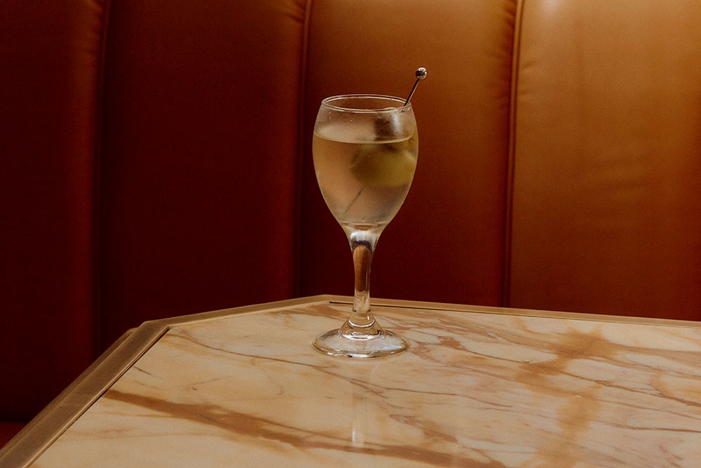 Glass of wine on a table at The French Exit, Brisbane CBD