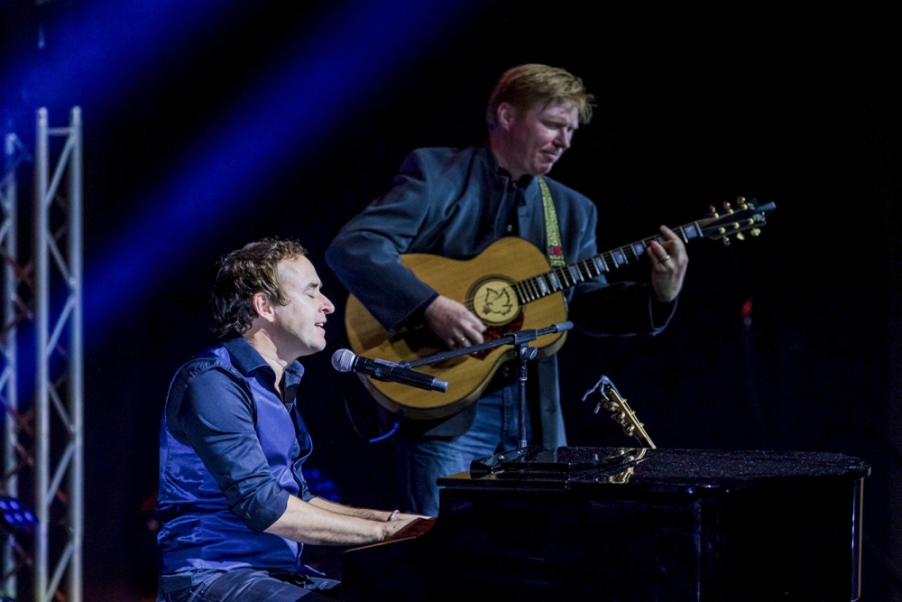 Damien Leith and Darren Coggan on stage