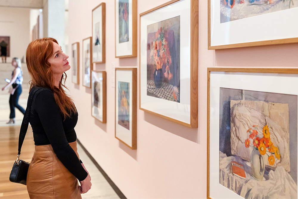 Woman looking at art GOMA