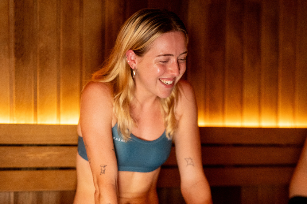 women smiling in sauna 