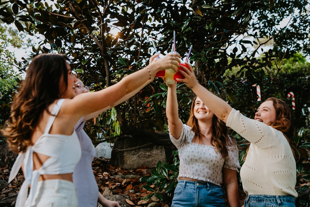 Friends toasting at Victoria Park putt Putt