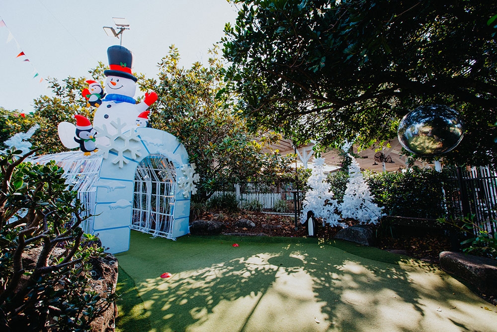 Snowman statue at Christmas Putt Putt