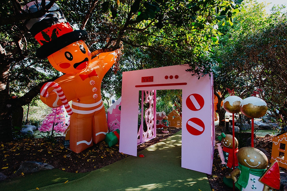 pink entry gate and orange snowman Christmas Putt Putt