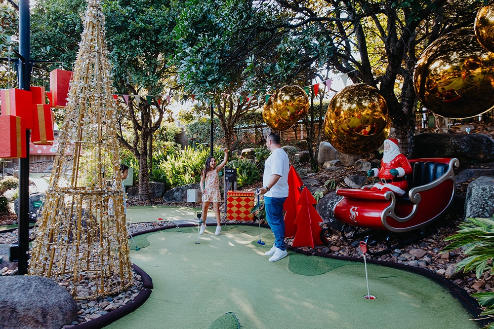 Gold Christmas tree at Christmas Putt Putt