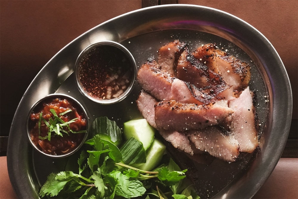 Thai food on a plate at Vela Kinn West End