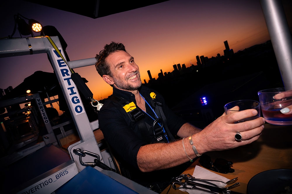 Man drinking inside Vertigo Brisbane Powerhouse