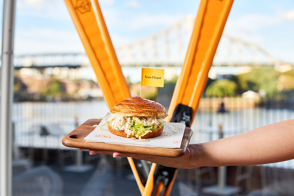Moreton Bay bug croissant on table