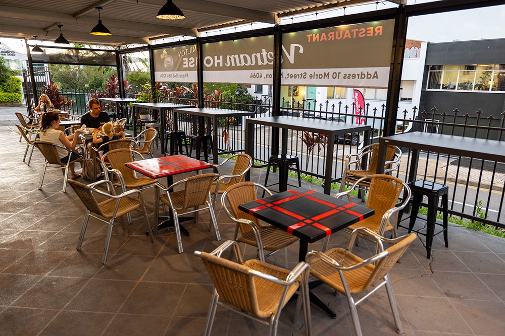 Seating inside Vietnam House Milton