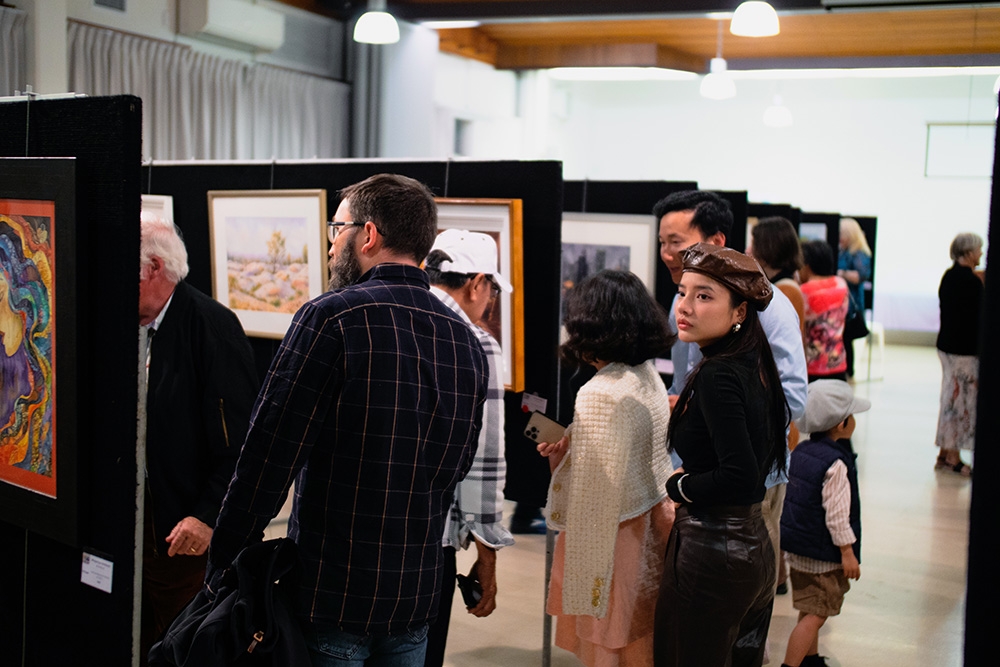 People looking at art