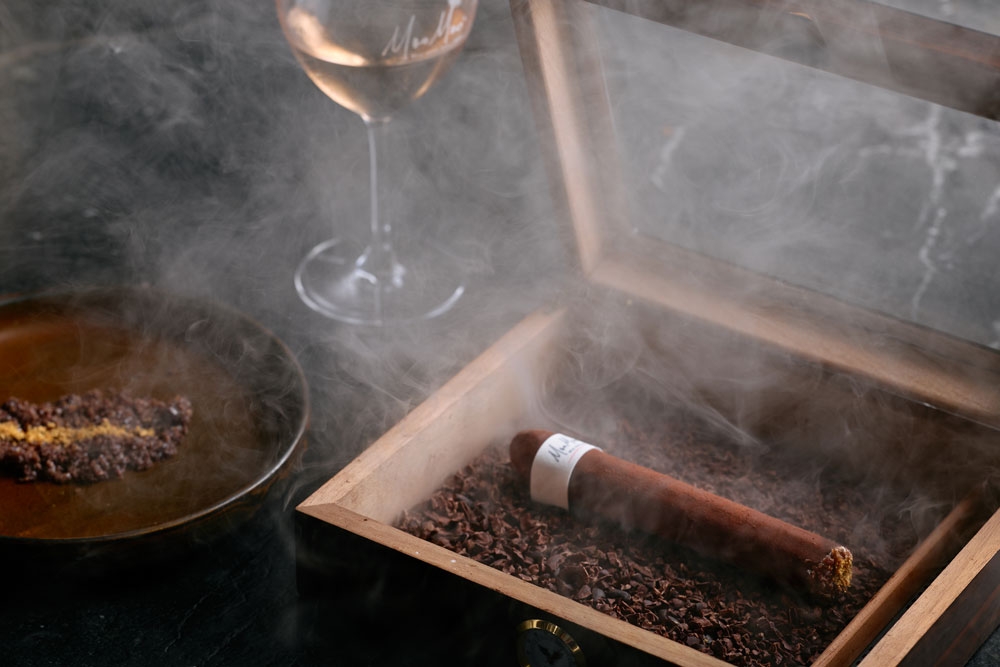 Wagyu-Cigar-Dessert-with-oki-Whisky-Mousse,-Candied-Wagyu-Bacon