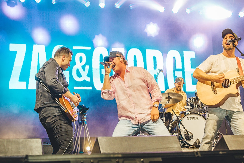 Zac and George performing on stage at the Toyota Tamworth Country Music Festival 