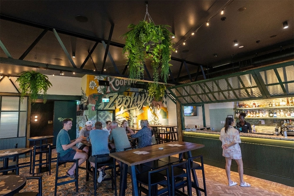 People seated at table in Zephyr Bar