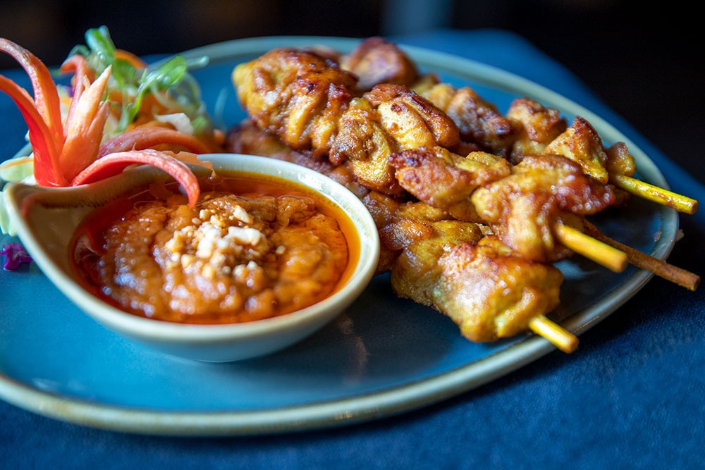 Plate of skewers with sauce at Boo's Kitchen, Woolloongabba