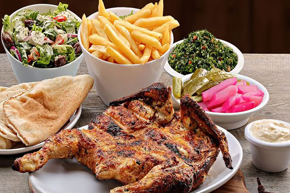Iraqi chicken and food on a plate with Babylon Restaurant & Lounge Moorooka