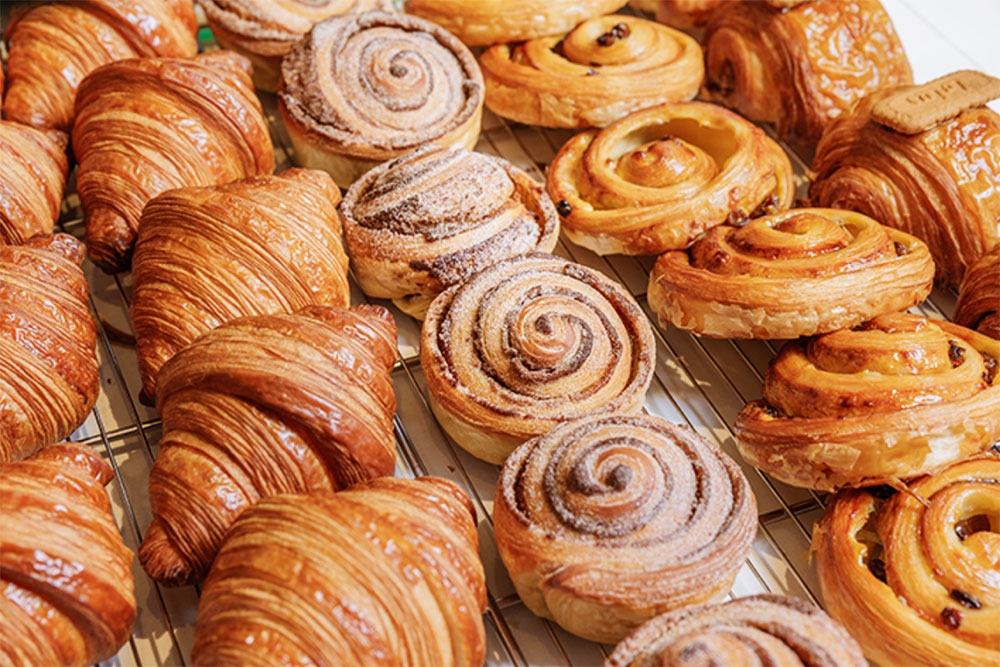 Pastries in rows at C'est Du Gâteau, South Brisbane