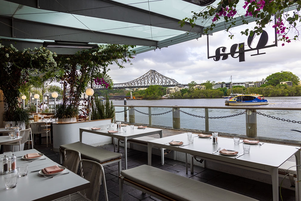 Outside seating overlooking Story Bridge and Brisbane River at Opa Bar & Mezze