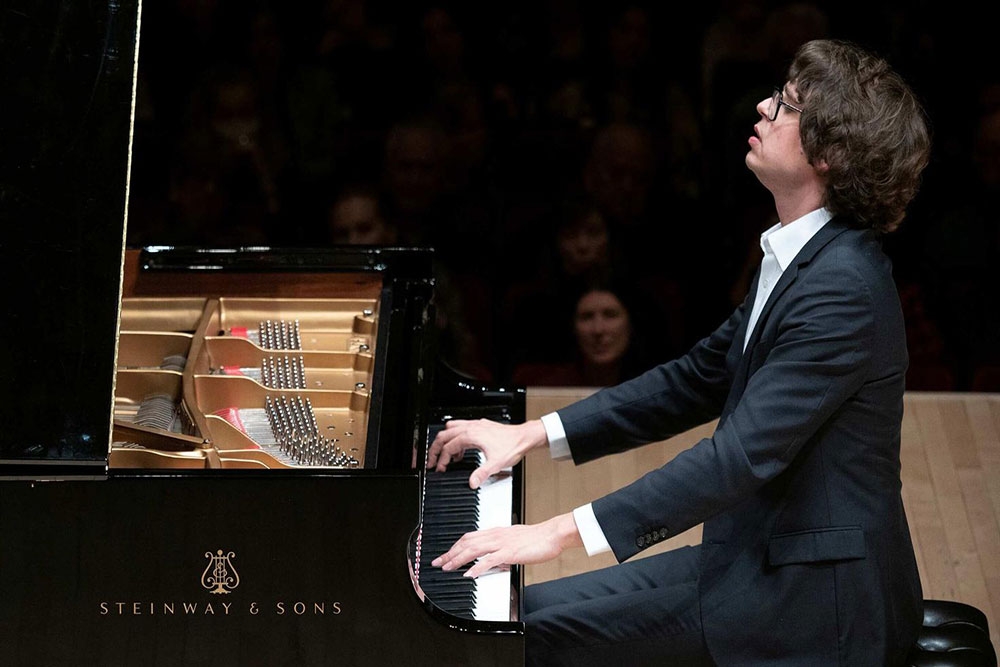 Lucas Debargue playing piano