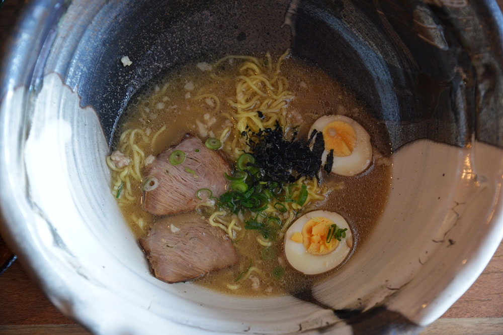 Japanese food in a bowl at Okuman Karaage & Ramen Bar West End