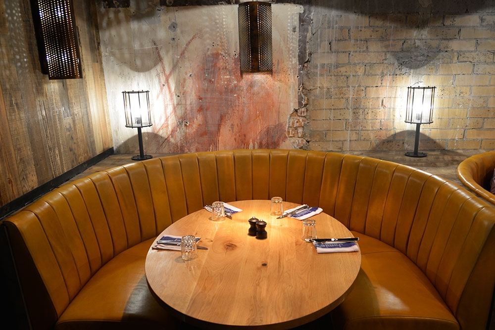 Oval sitting booth