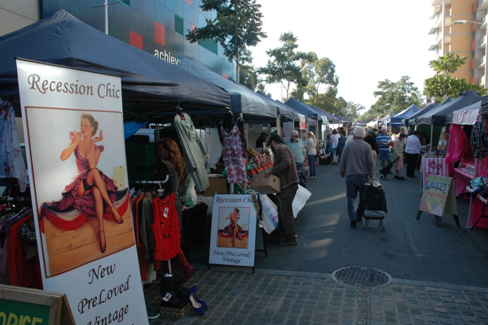 People browsing stalls Kelvin Grove Urban Village Markets 