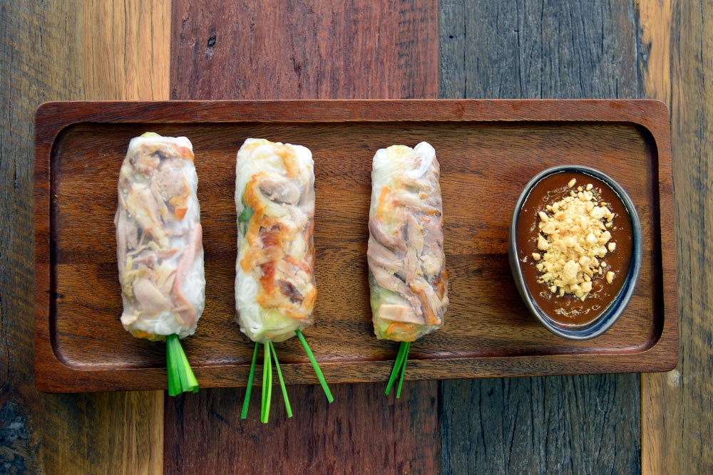 Little Saigon Grill's spring rolls on board with sauce 