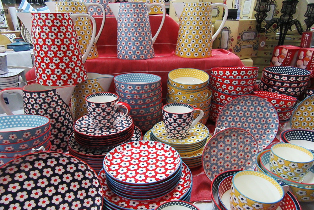 Colourful jugs and crockery inside Marcia's on Montague West End