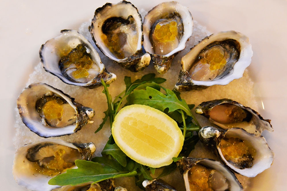 Plate of oysters at Six Acres Restaurant Bowen Hills
