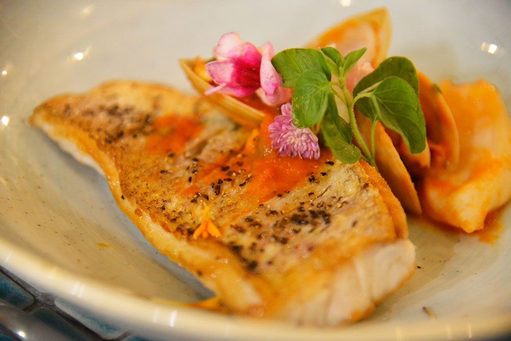 Fish on a plate at Six Acres Restaurant Bowen Hills