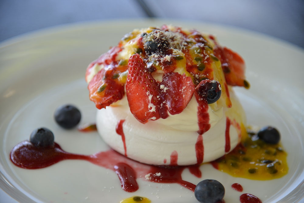 Crisp Meringues filled with fresh berries, banana, passionfruit, Chantilly Cream and shaved white chocolate or the Italian classic Tiramisu